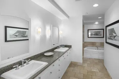 a white bathroom with two sinks and a tub at Amazing Gulf Views 425A WaterSound Crossings 3BR Steps to Beach and Pool! condo in Panama City Beach