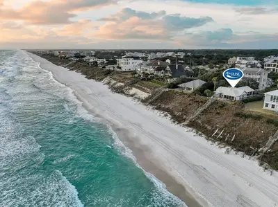 an overhead view of a beach with a road sign at Gulf Front Home in Seagrove Beach, FL with 3 Bedrooms and 3 Bathrooms home in Santa Rosa Beach