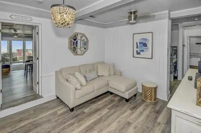 a living room with a couch and a table at Gulf Front Home in Seagrove Beach, FL with 3 Bedrooms and 3 Bathrooms home in Santa Rosa Beach