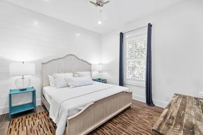 a white bedroom with a bed and a window at Private Pool and Short Walk to the Beach - Seagrove Beach FL home in Santa Rosa Beach