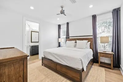 a white bedroom with a bed and a window at Private Pool and Short Walk to the Beach - Seagrove Beach FL home in Santa Rosa Beach