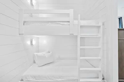 a white bunk bed in a white room at Private Pool and Short Walk to the Beach - Seagrove Beach FL home in Santa Rosa Beach
