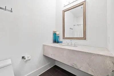 a bathroom with a large marble sink and a mirror at Private Pool and Short Walk to the Beach - Seagrove Beach FL home in Santa Rosa Beach
