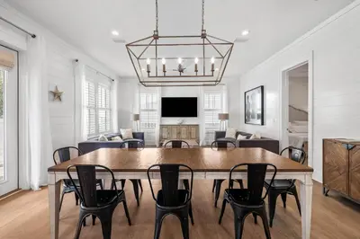 a dining room with a table and chairs at Private Pool and Short Walk to the Beach - Seagrove Beach FL home in Santa Rosa Beach