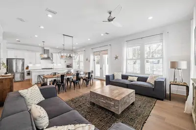 a living room with a couch and a table at Private Pool and Short Walk to the Beach - Seagrove Beach FL home in Santa Rosa Beach