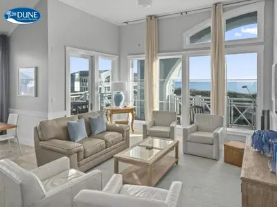 a living room with a couch and chairs and a table at AMAZING GULF VIEWS 420B WaterSound Crossings 3BR, Corner Unit condo in Panama City Beach