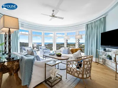 a living room with white furniture and a large window at GULF VIEWS from ALL Bedrooms! 308 Compass Point 1 in WaterSound - Short walk to the beach and pool condo in Panama City Beach