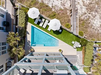 an overhead view of a swimming pool at a resort at Gulf Front Luxurious Home with Private Pool and Beach Access home in Panama City Beach