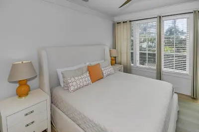 a white bedroom with a bed and a window at Gulf Views, Private Pool, Luxurious Home - Vista Del Mare home in Santa Rosa Beach