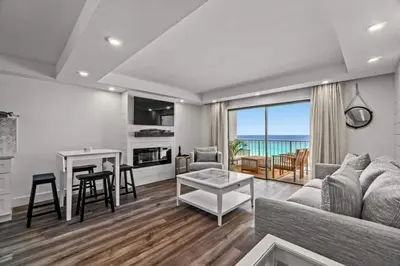 a living room with a couch and a table at Summit 803 - Luxury Beach Resort Condo 1-6 People in Panama City Beach