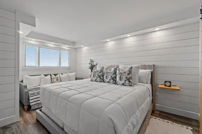 a white bedroom with a large bed in it at Summit 803 - Luxury Beach Resort Condo 1-6 People in Panama City Beach