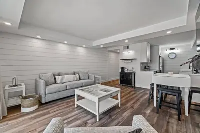 a living room with a couch and a table at Summit 803 - Luxury Beach Resort Condo 1-6 People in Panama City Beach