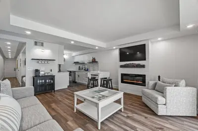a living room with a couch and a table at Summit 803 - Luxury Beach Resort Condo 1-6 People in Panama City Beach