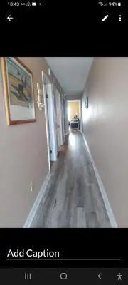 an empty hallway of a house with a hallway at The Summit Condo Resort in Panama City Beach