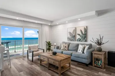 a living room with a couch and a table at Summit 808 - Luxury Beach Resort Condo 1-6 People in Panama City Beach