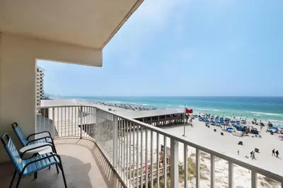 a balcony with a view of the beach and the ocean at Shores of Panama 431 in Panama City Beach