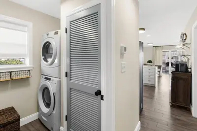 a laundry room with a washer and dryer at Serenity by the Sea in Santa Rosa Beach