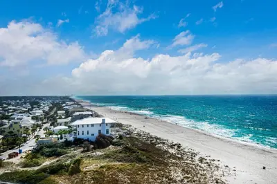 an aerial view of a beach with houses and the ocean at Pinnacle Port A-910 in Panama City Beach