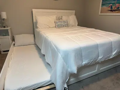 a large white bed in a room with a mattress at St Thomas Square Villa 414 in Panama City Beach