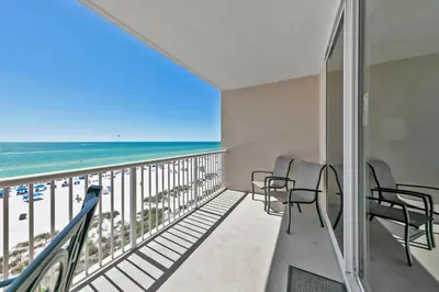 a balcony with a view of the beach at Majestic Beach Towers 1-407 in Panama City Beach