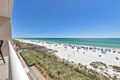 a view of a beach with umbrellas and people at Majestic Beach Towers 1-407 in Panama City Beach