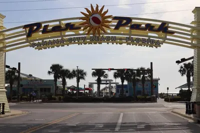 a large sign for a pizza park in a street at Lazy Palm 4 Pools Short Walk To Beach! Sleeps 5! in Panama City Beach