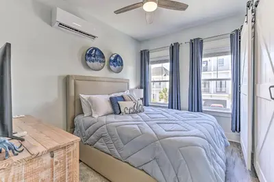 a bedroom with a bed and a window at Inlet Beach Escape about half Mi to Beach Access! in Inlet Beach