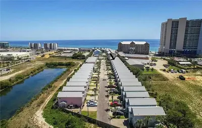 an aerial view of a city with the ocean at Sand Castles West T8 in Panama City Beach