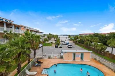 an overhead view of a pool at a resort at Sand Castles West T8 in Panama City Beach