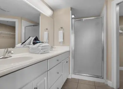 a bathroom with a sink and a shower at Treasure Island 2102 Beach Front in Panama City Beach