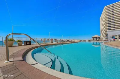a large swimming pool on the side of a building at Treasure Island 2102 Beach Front in Panama City Beach