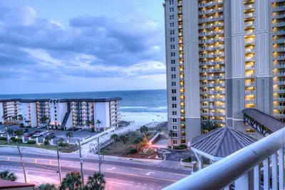 a view of the ocean from a balcony of a building at Grand Panama 2-307 in Panama City Beach