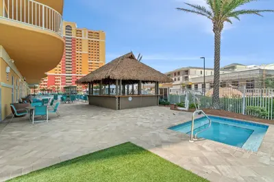 a resort with a swimming pool and a gazebo at New Calypso Beach Resort Corner Unit Sleeps 8! by Dolce Vita Getaways PCB in Panama City Beach