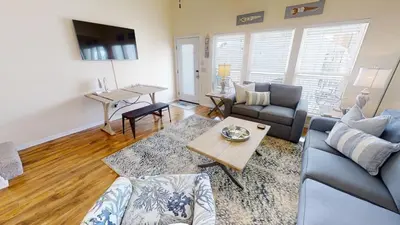 a living room with a couch and a table at Southwind Condominiums 6-B in Panama City Beach
