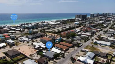 an aerial view of a city and the ocean at Blue Neptune at 5313 Sunset Avenue by Nautical Properties Vacation Rentals in Panama City Beach