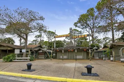 a building with a sign on top of it at Shores of Panama 1206 - Amazing Studio, Free Fun! Sleeps 3, Romantic condo in Panama City Beach