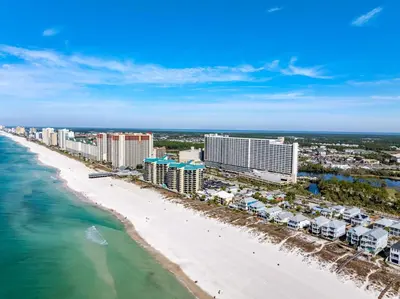 an aerial view of the beach and hotels at Spacious Beach Condo with Gulf Views! Sleeps 8! by Dolce Vita Getaways PCB in Panama City Beach