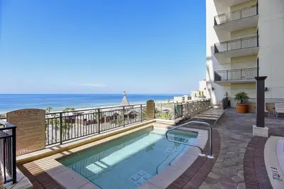 a swimming pool on the balcony of a hotel at Origin 1036, Perfect for 4! Beautiful sunset and Gulf of Mexico view! Free Activities! condo in Panama City Beach
