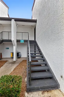 a stairway leading up to a building at Edgewater Villas #2108 - 2 Bedroom 2Bath Sleeps 8, Free Gas Card & Free Fun! condo in Panama City Beach