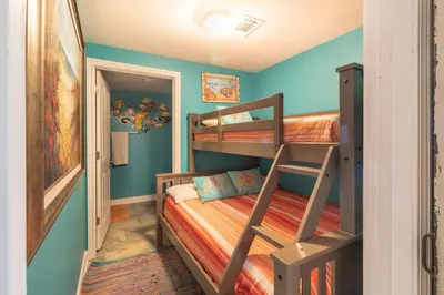 a bunk bed room with two bunk beds at Shores of Panama 621-Sleeps 8, Free Beach Fun! Reserved Parking Space! condo in Panama City Beach
