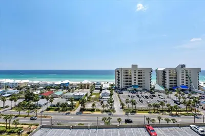 an aerial view of a parking lot with the beach at Laketown Wharf 1003, Gulf View, Sleeps 6, Free Fun! Updated! condo in Panama City Beach