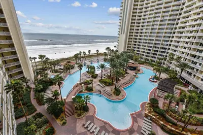 an aerial view of the resort pools and the beach at Shores of Panama 821-2 Bd 3Ba, Sleeps 8! Updated, No Carpet! Free Fun! condo in Panama City Beach