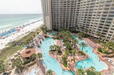 an aerial view of the pools at the resort with the beach at Shores of Panama 325 - 3rd Floor, Updated, Free Fun! Sleeps 6, condo in Panama City Beach