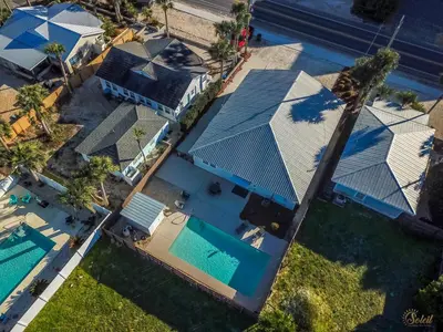 an overhead view of a house with a swimming pool at Private Pool - Steps To Beach - Fenced Backyard - FLPCB74 in Panama City Beach