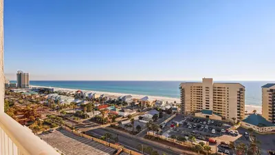 a view of the beach from the balcony of a resort at Laketown Wharf #1211 by Nautical Properties Vacation Rentals in Panama City Beach