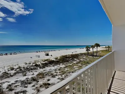 a balcony with a view of the beach at Edgewater Leeward #206 in Panama City Beach