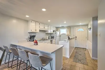 a kitchen with a large island in the middle at Pool and Beach Access Sunnyside 55 in PCB! in Panama City