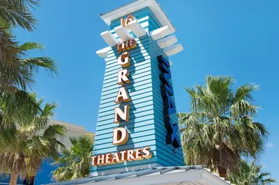 a sign for the anaheim theatres hotel at Penthouse! Beautiful Views! Newly Remodeled and Listed! in Panama City Beach