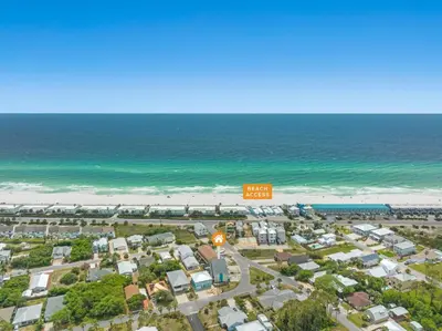 an aerial view of a beach with houses and the ocean at 120 Palm Beach Dr A - La Casa Turquesa in Panama City Beach