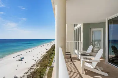 a view of the beach from the balcony of a beach house at Beautiful Long Beach Condo unit 1-1206! TWO Gulf Masters! in Panama City Beach